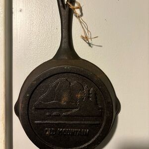 Absolutely adorable miniature cast iron pan